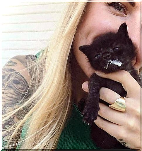 Kitten Lady with a black kitten